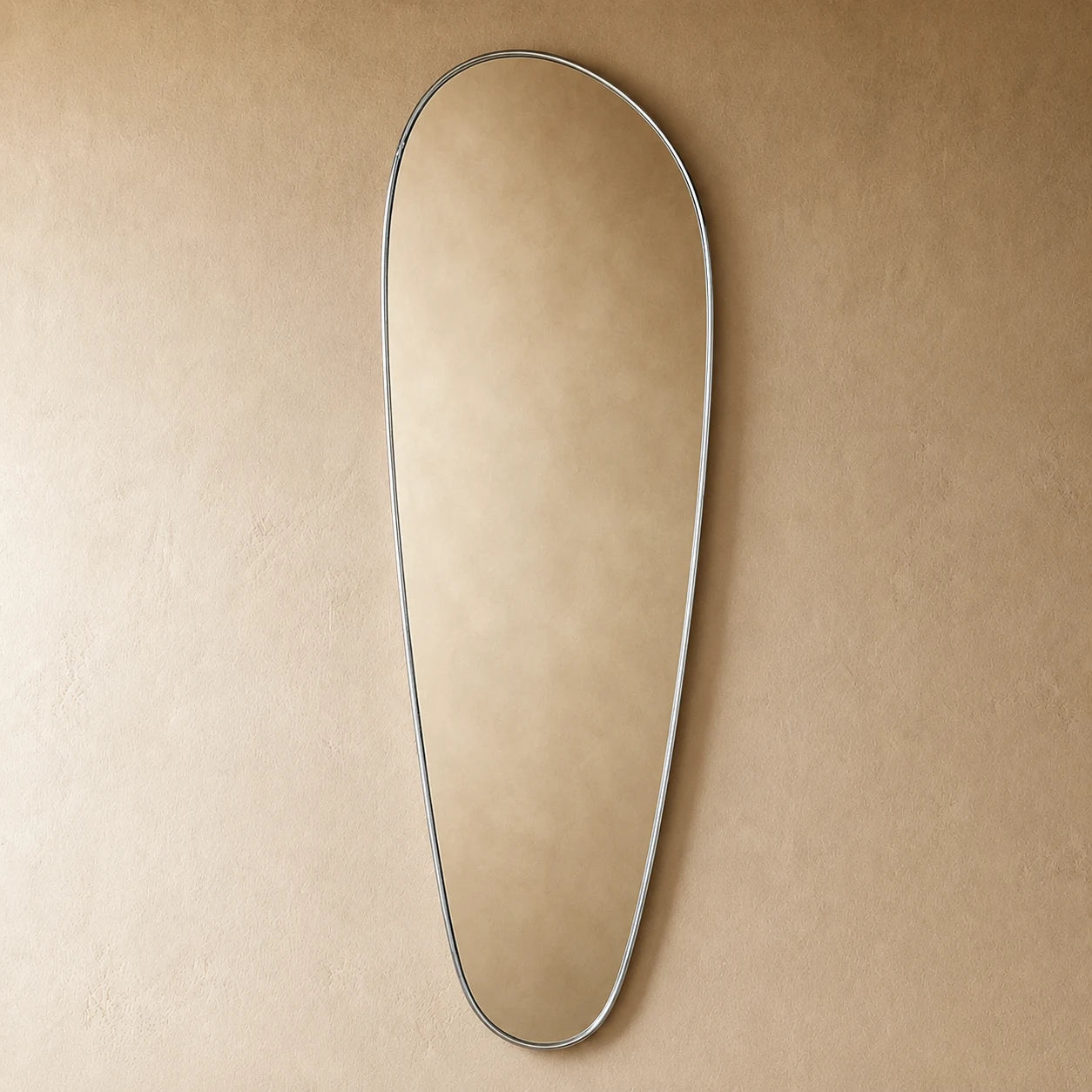 Solene Mirror Silver — chrome teardrop wall mirror, hero