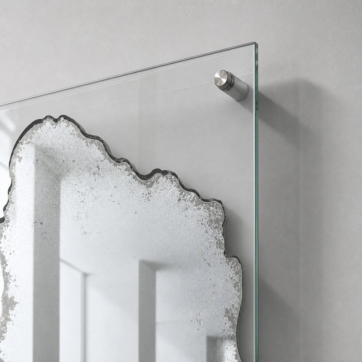 Patina Mirror clear glass corner and metal wall mount detail