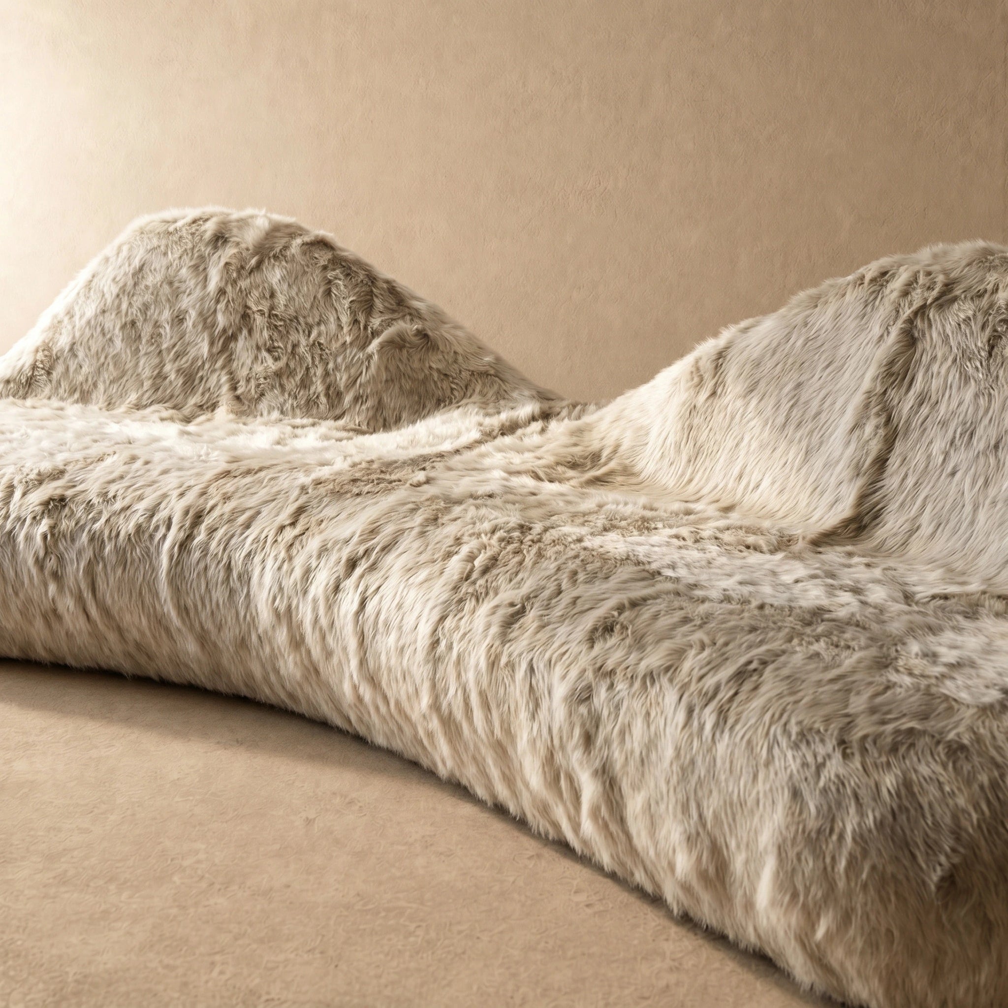 Ivory cream shaggy faux fur organic boulder sofa, side profile