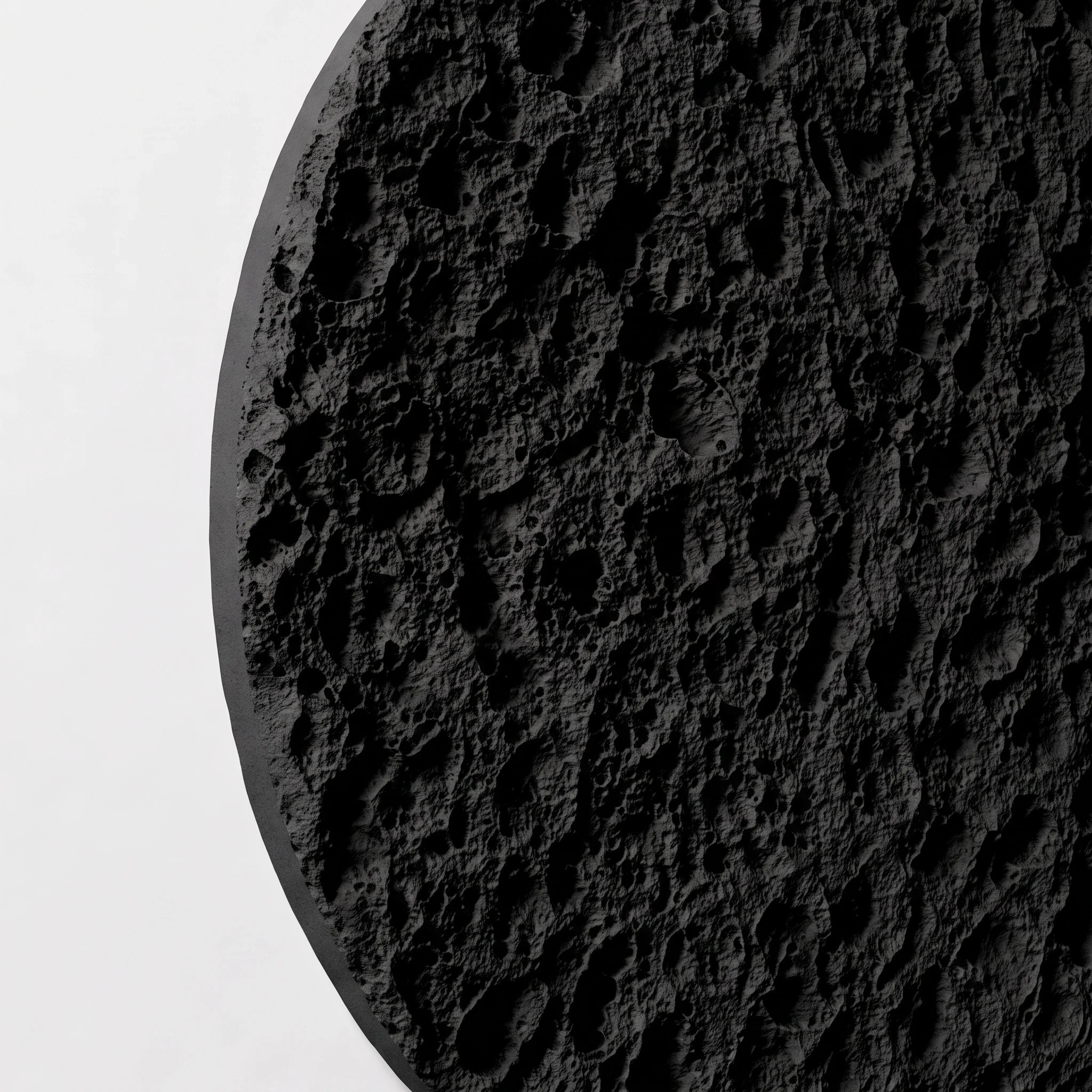 Angled close-up of the deep channels and granular relief on Erosion Obsidian Void