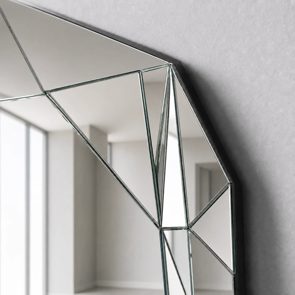 Close-up of angular faceted mirror panel junctions
