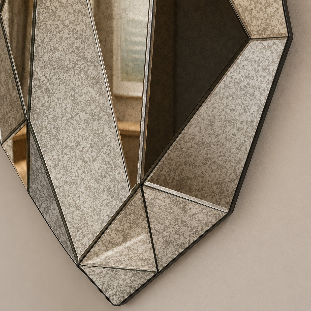 Antiqued smoke mirror lower facet detail — dark seams dividing antiqued glass panels