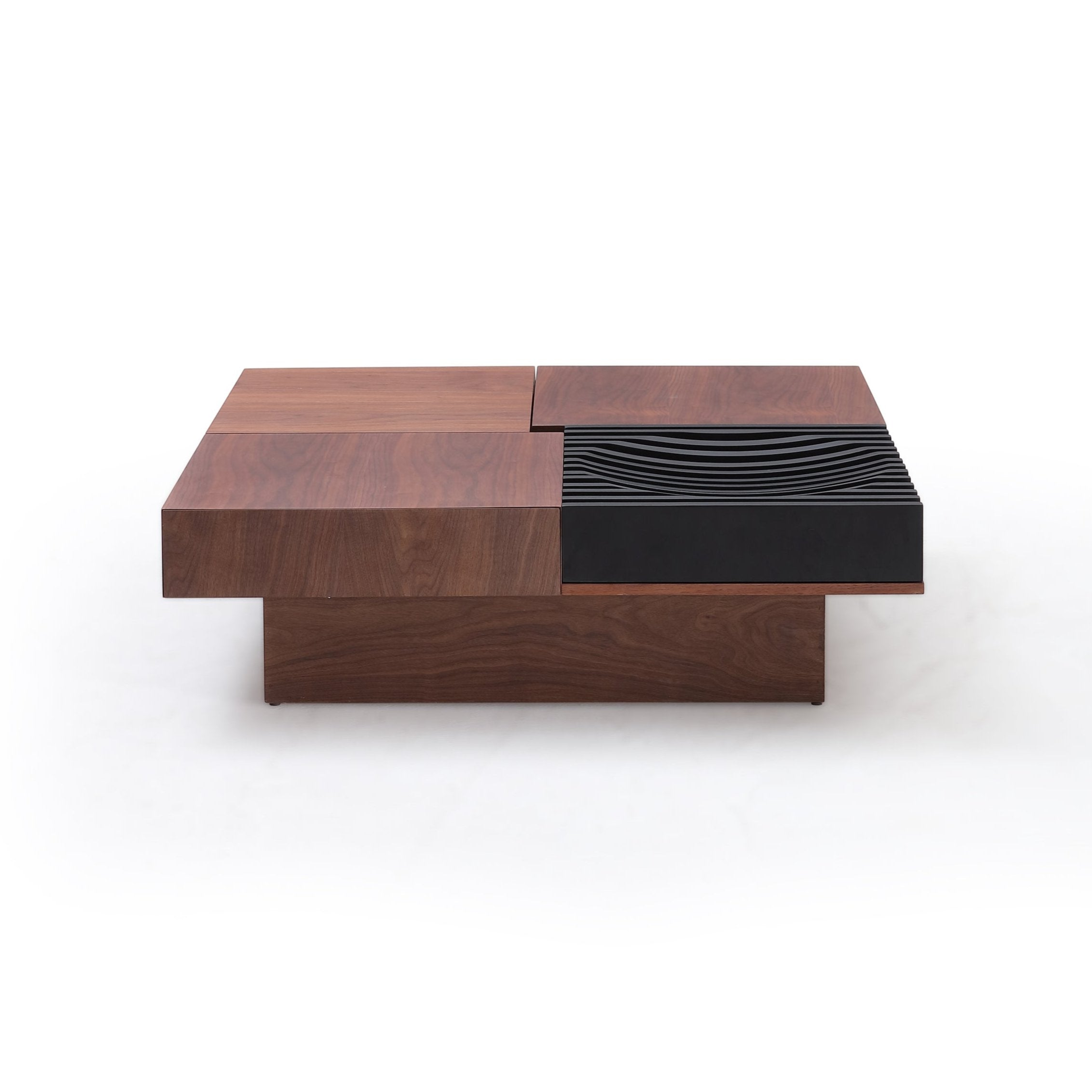 Modern coffee table with a modular design, combining dark wood panels and black wave-textured sections in a rectangular shape.