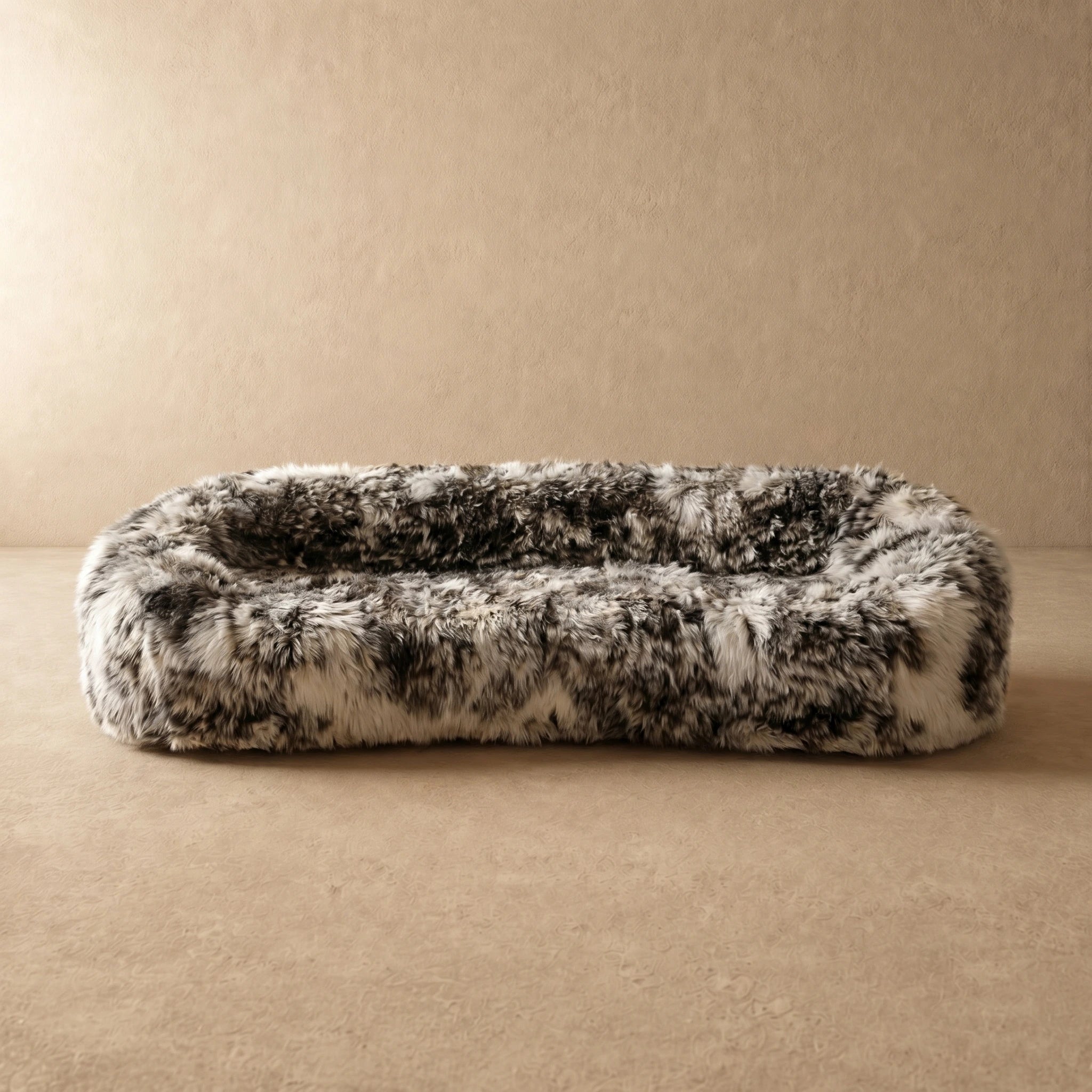 Black and white shaggy faux fur oval pod sofa, three-quarter view