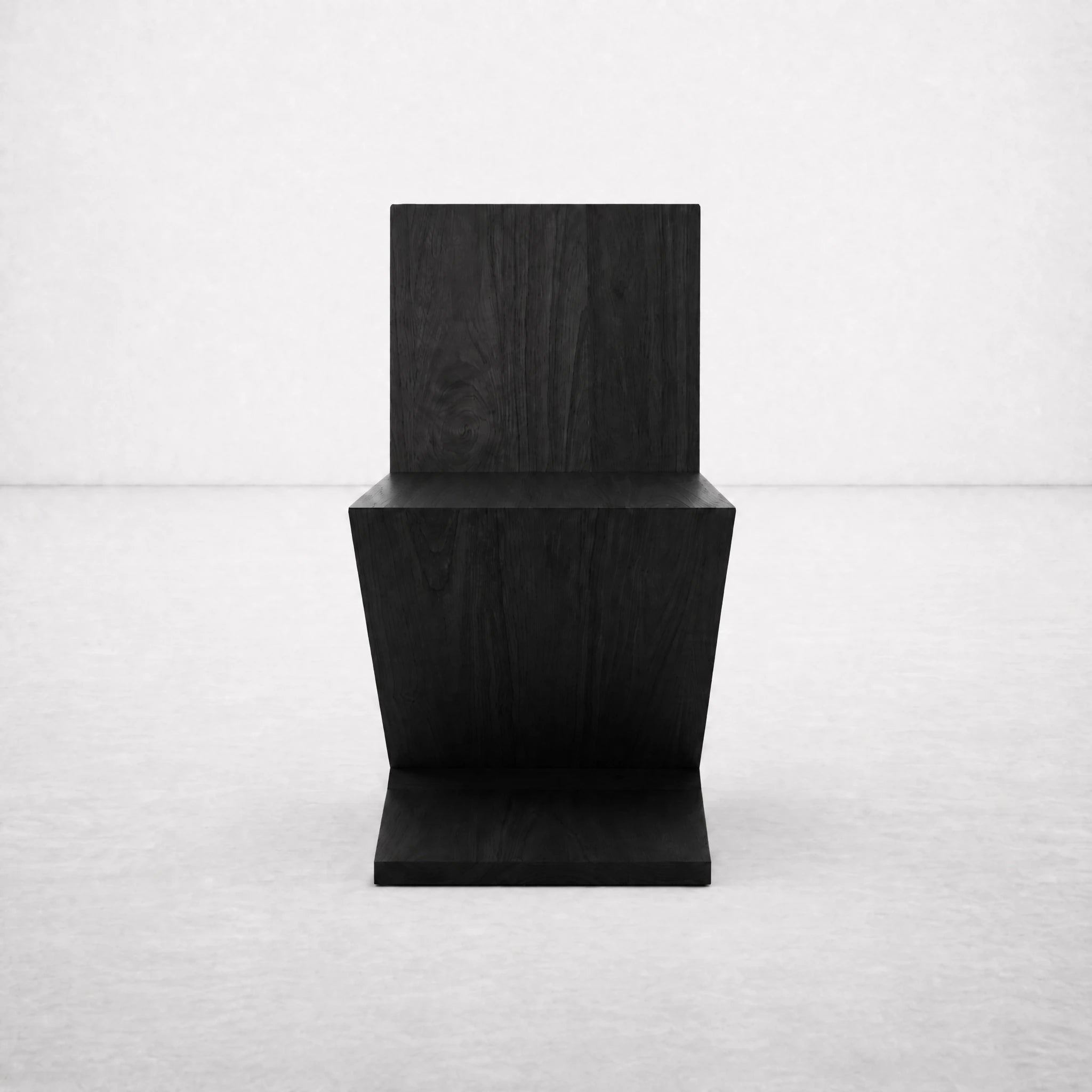 Black Zig Zag Chair front view — continuous folded timber form