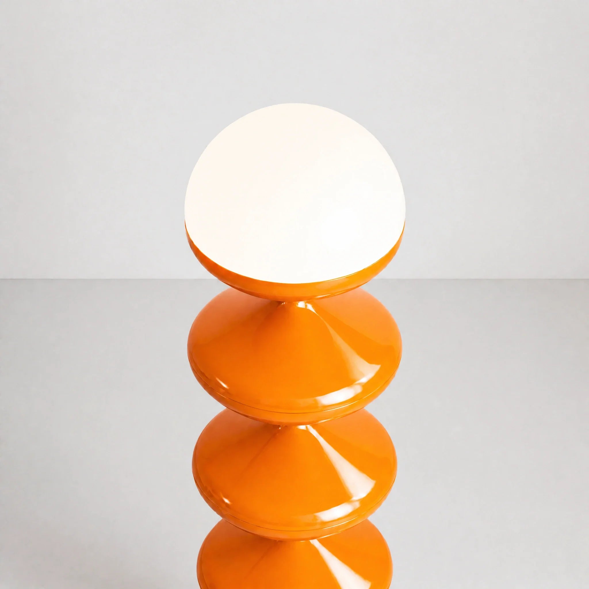 Orange gourd floor lamp with stacked metal discs and frosted dome — view 7