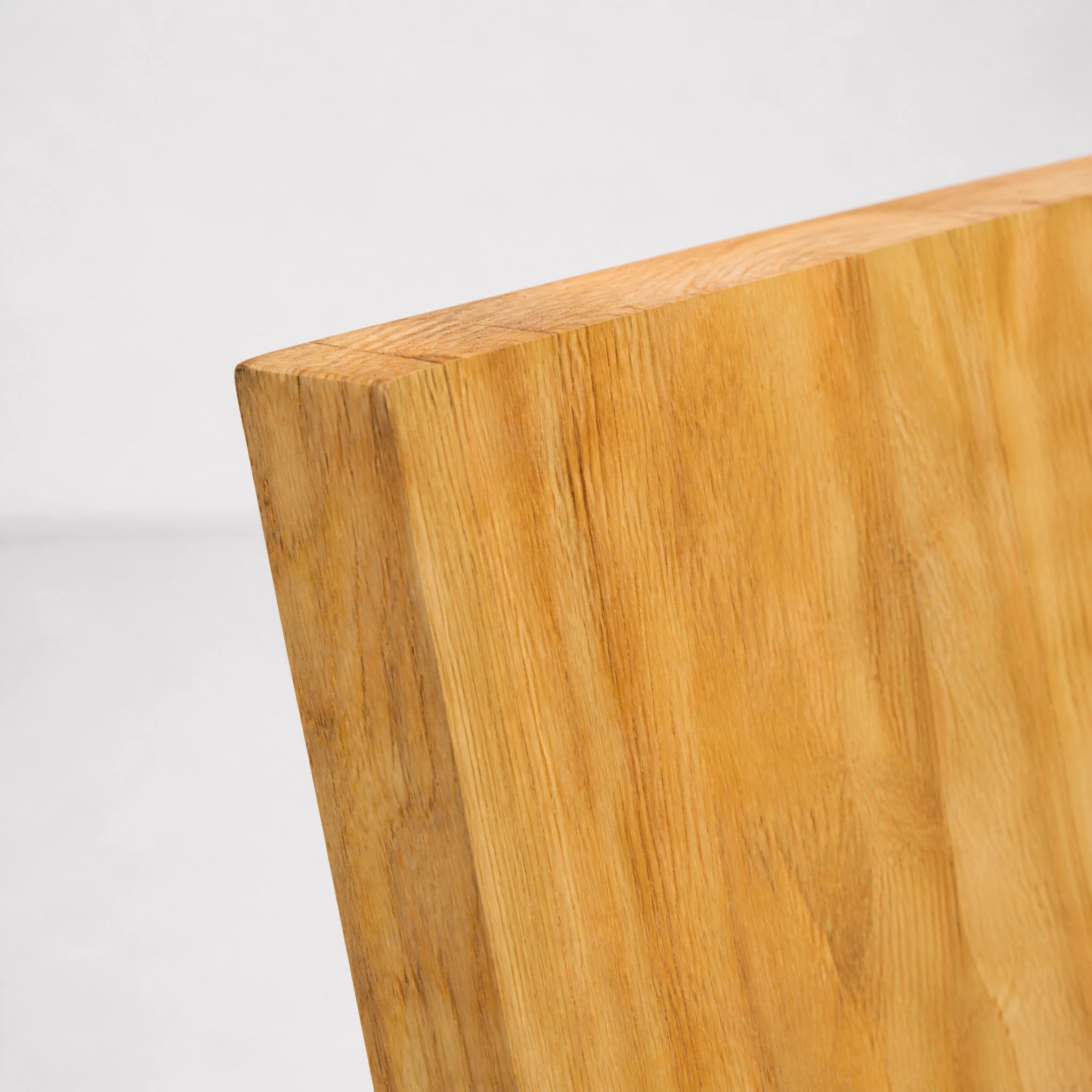 Natural Wood Zig Zag Chair angled view showing the zig-zagging plane