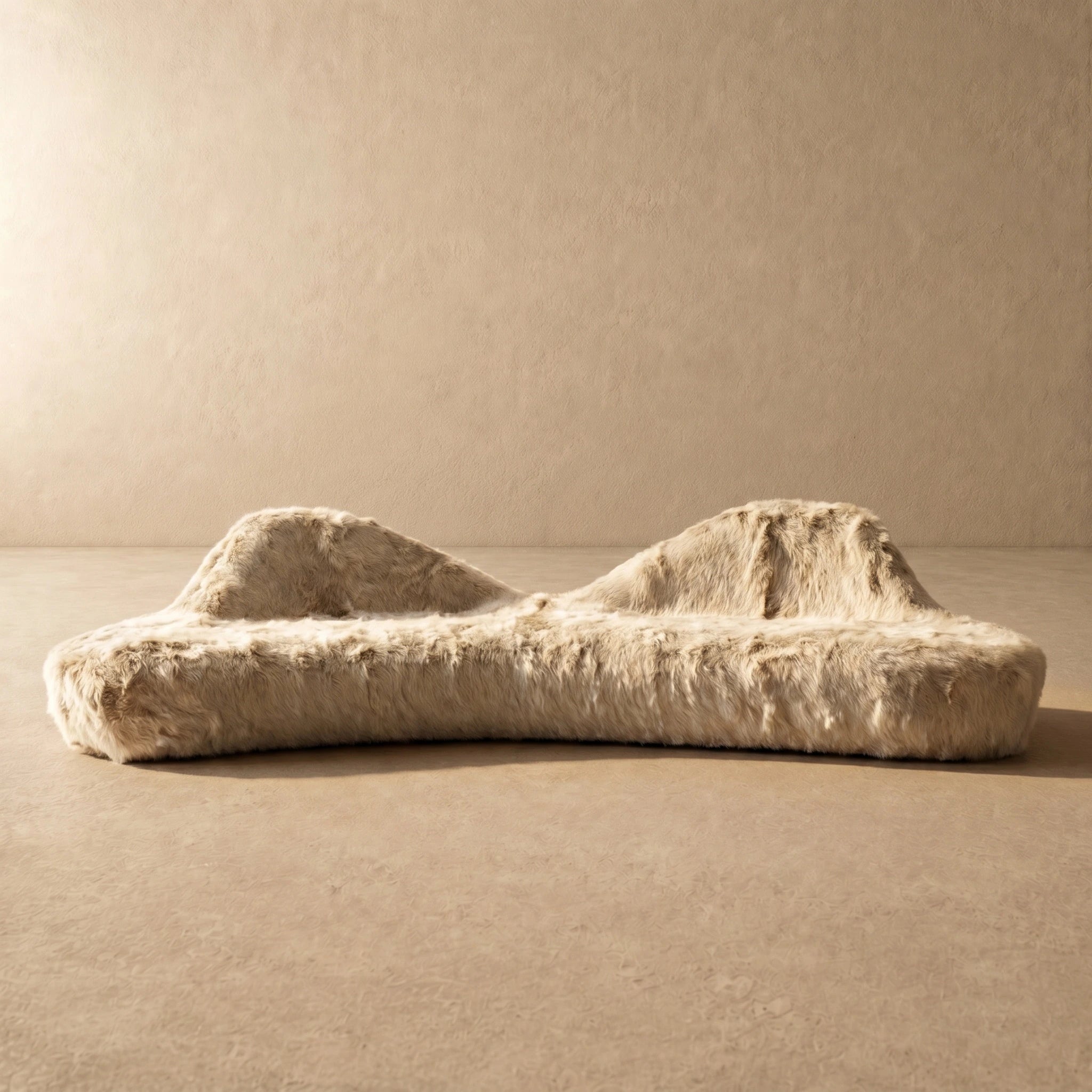 Ivory cream shaggy faux fur organic boulder sofa, oblique view