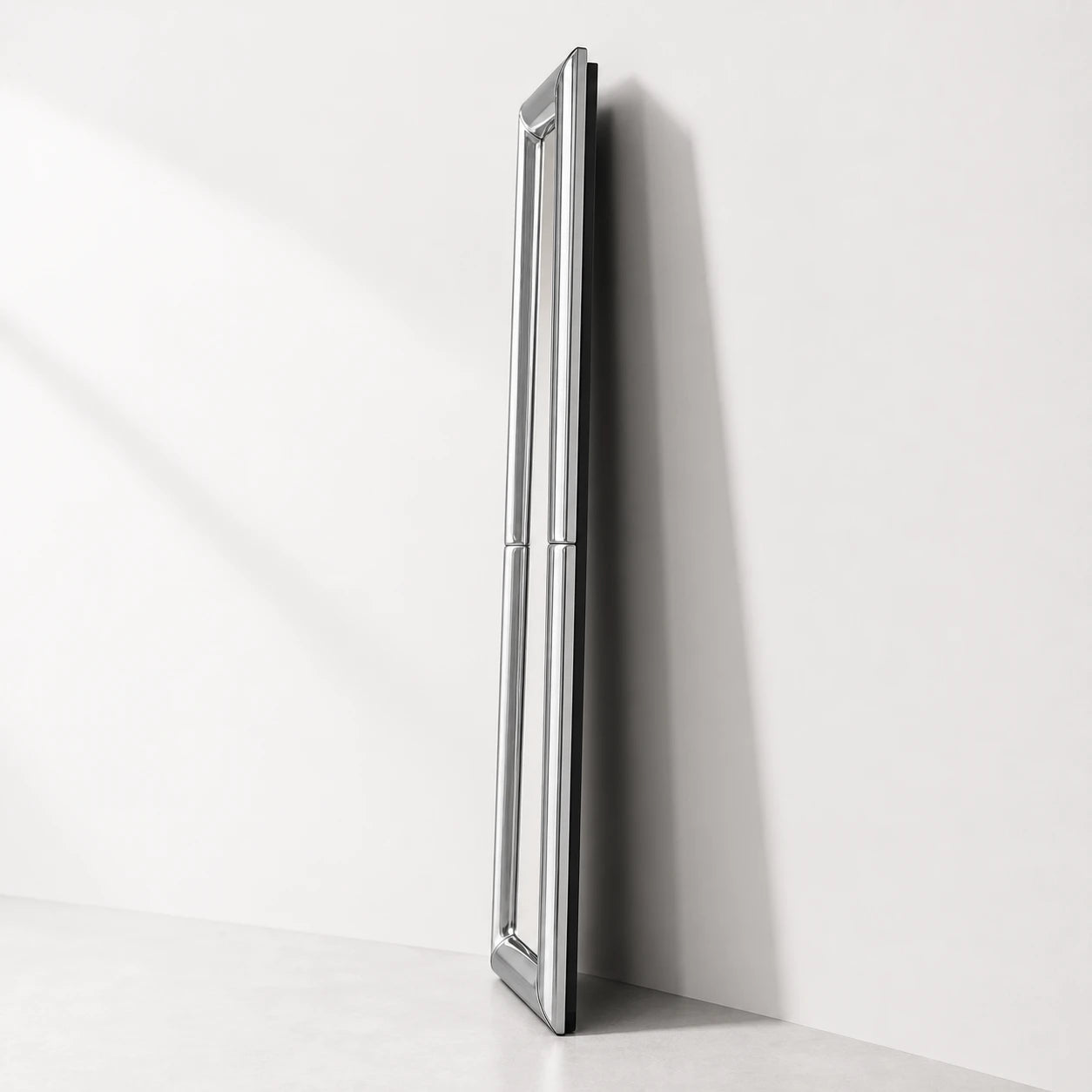 Atrium Floor Mirror side profile showing the bent-glass frame depth