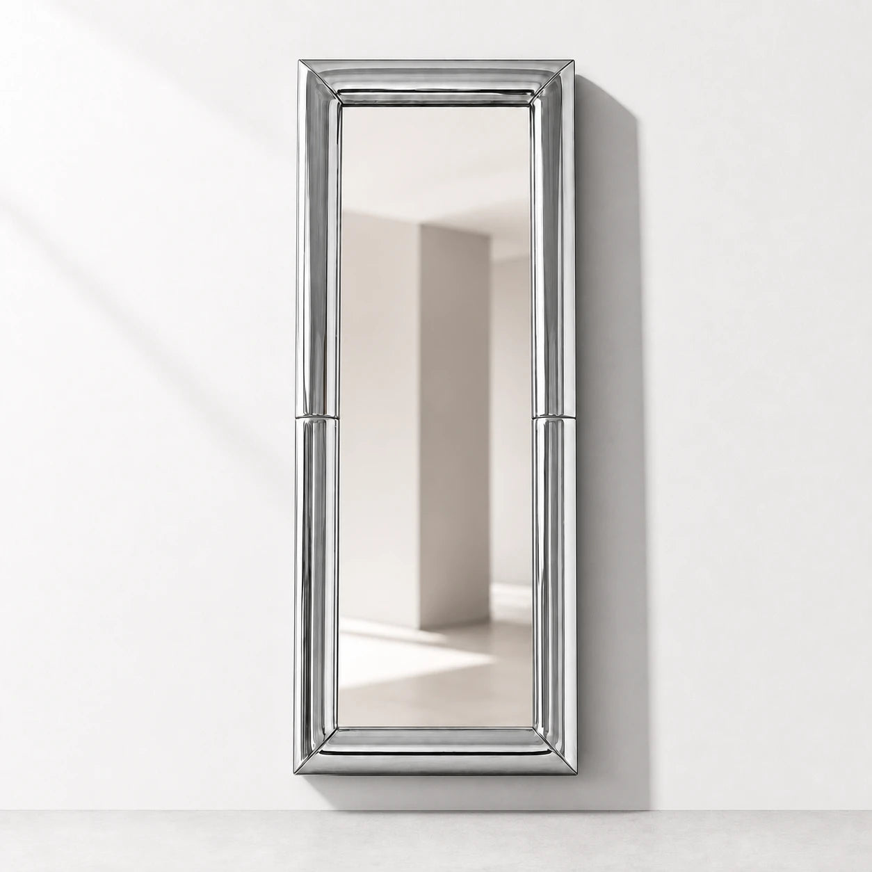 Atrium Floor Mirror wall-mounted just above the floor
