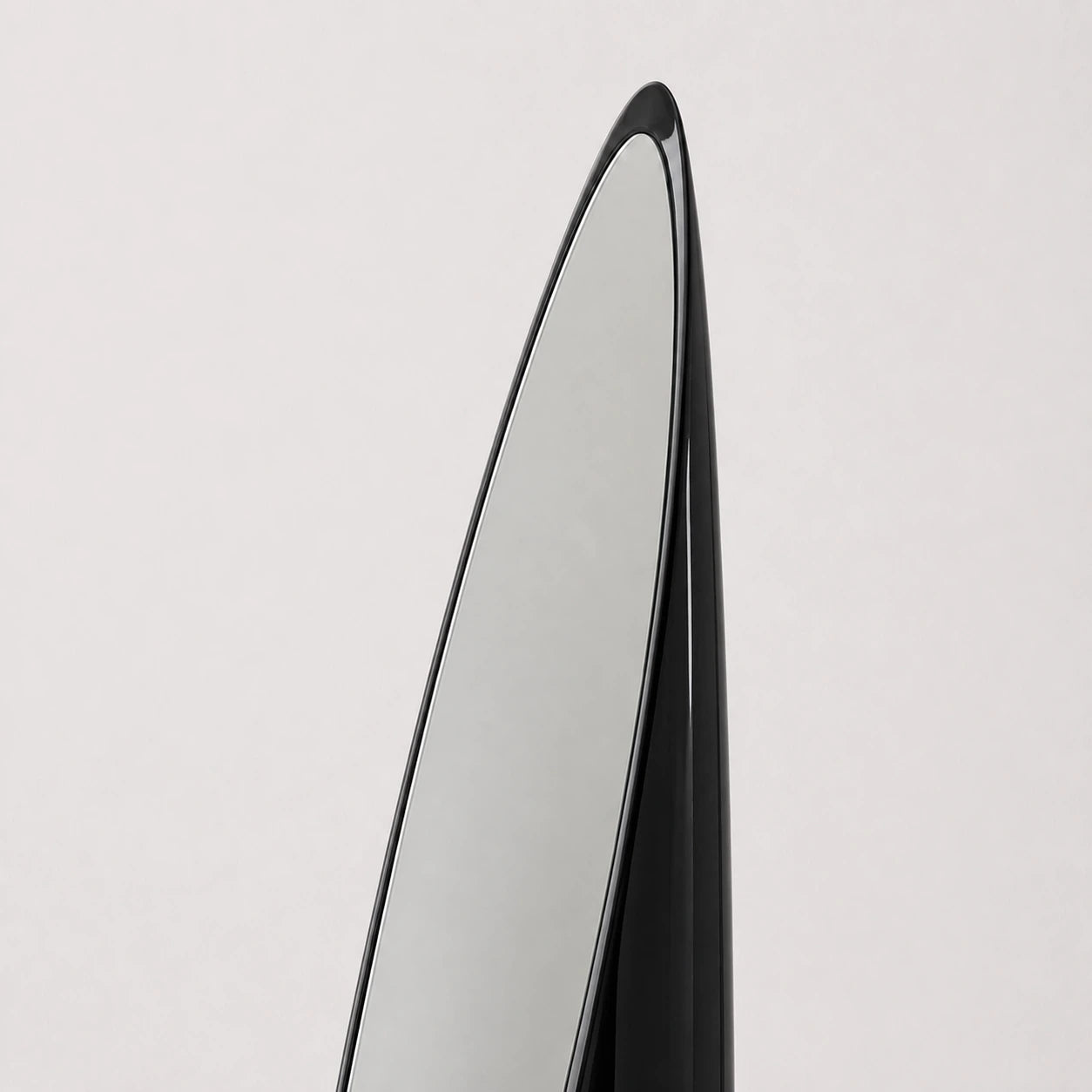Black Lipstick Mirror, upper frame detail — Interior Moderna