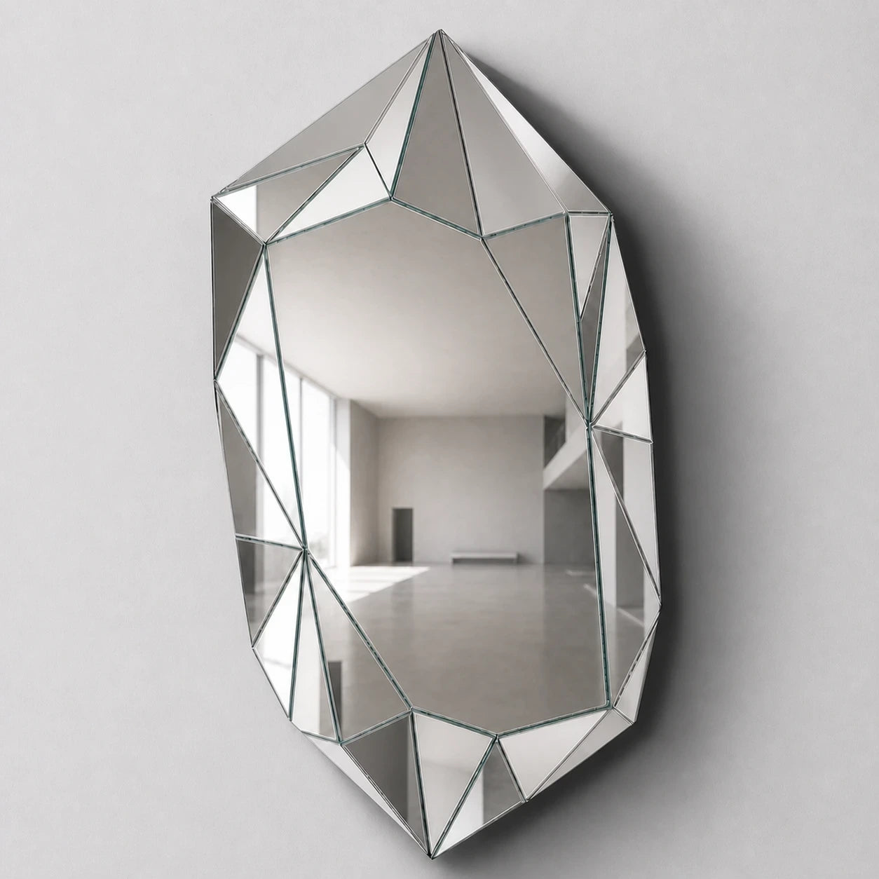 Large silver irregular faceted wall mirror, front hero view