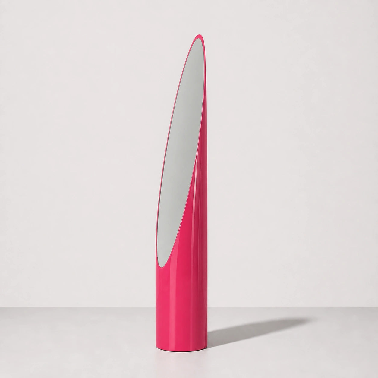 High-gloss pink Lipstick floor mirror in a warm neutral studio, front hero view