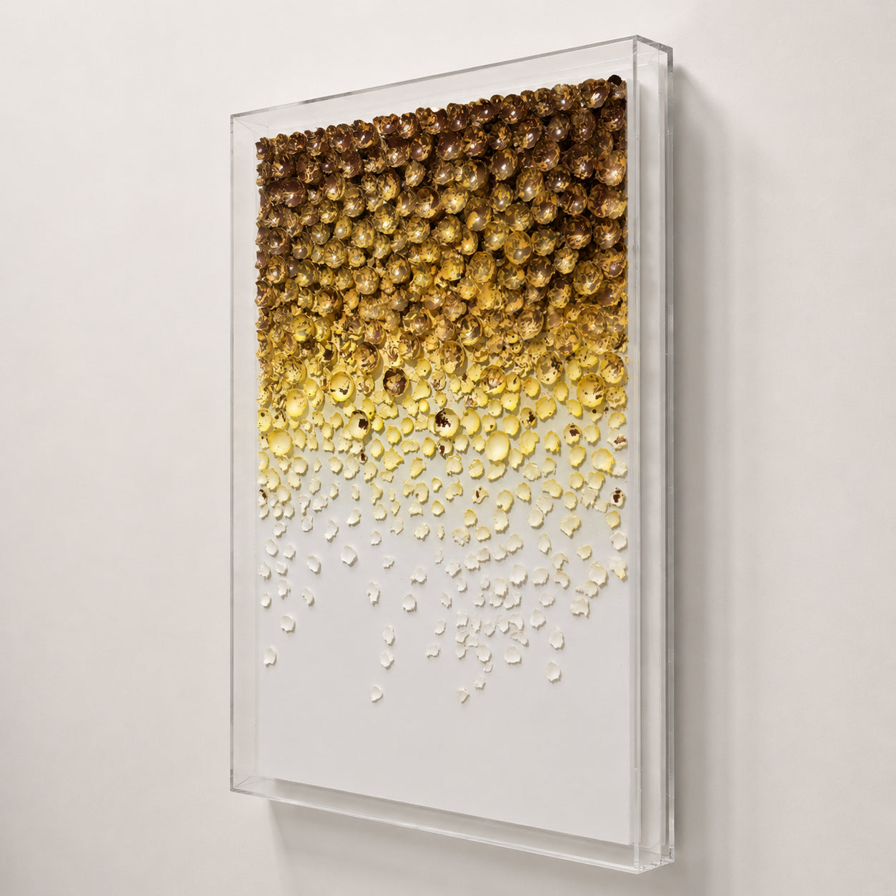 Sedimentation | Citrine gold sphere wall art — oblique angle showing acrylic frame depth